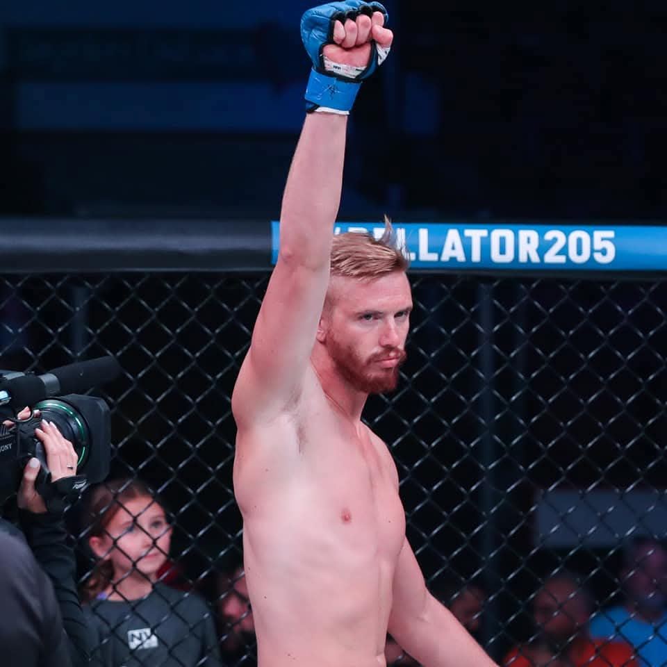 Sean Powers raises his fist after a fight at Bellator 205